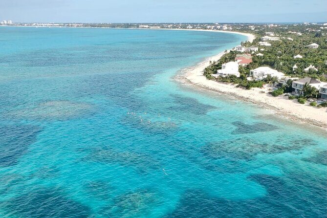 1 Hour Private Parasailing Charter, Grace Bay, Providenciales - Music, Photos, and Getting the Shot You Actually Want