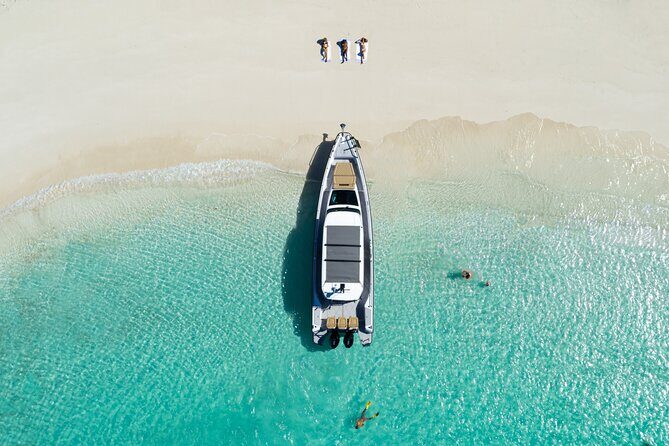 2-Hour Luxury Axopar Private Charter! Explore the Turks in style! - Onboard Comfort: Sundeck, Restroom, and Included Drinks