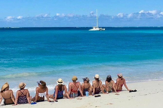 4 Hour Private Catamaran Sail and Snorkel from Grace Bay Beach, Providenciales - Stop 1 on Grace Bay Beach: boarding, settling in, and getting out fast