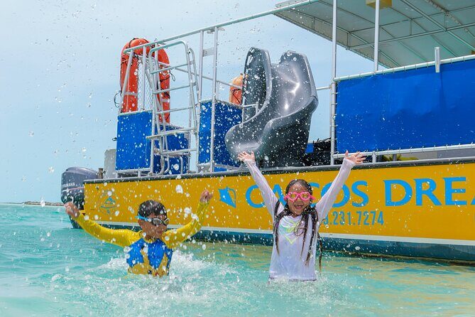 Afternoon Half Day Cruise from Providenciales with Snorkeling and Iguana Island - Getting There: Hotel Pickup, Beach Hut Check-In, and Start Time