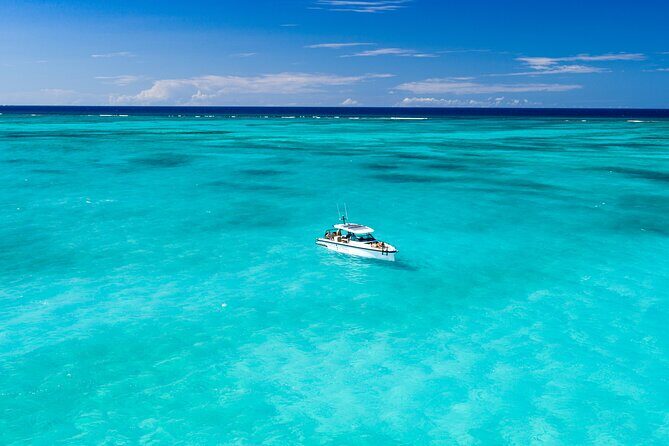 Half Day Private Luxury Axopar Charter in Turks & Caicos - Meeting at the Ritz-Carlton and settling into the Axopar 37