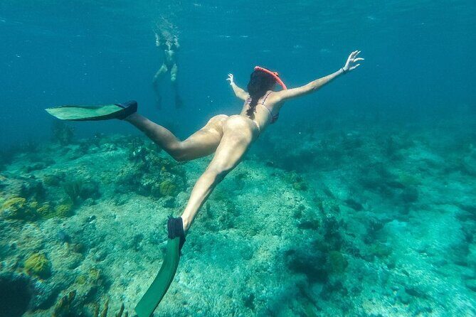 Half Day Snorkel from Providenciales with Visit to Half Moon Bay - Getting out of Grace Bay: pickup, boat size, and the on-board mood