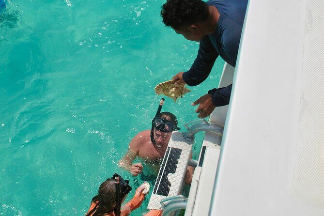 Half Day Snorkel from Providenciales with Visit to Half Moon Bay - The onboard extras: rum punch, breakfast and lunch, and the slide