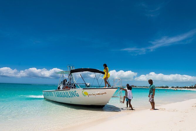 Parasailing Adventure from Providenciales in Turks and Caicos - Grace Bay Beach pickup that stays simple (and sometimes busy)
