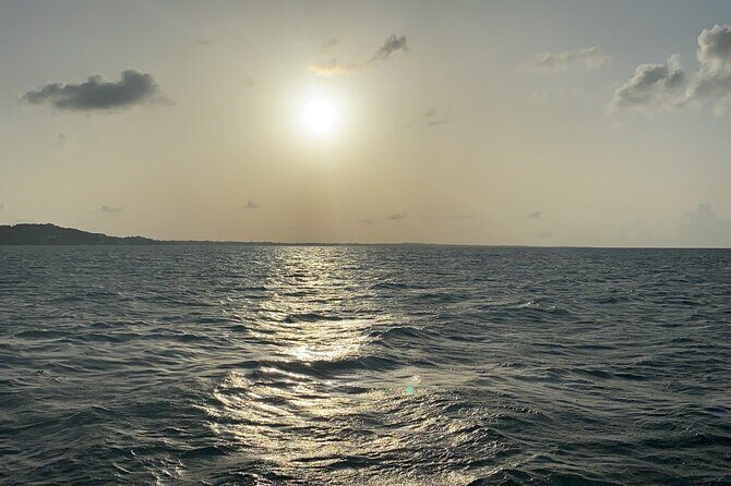 Private Catamaran Sunset Cruise in Turks and Caicos - The Old Soviet Shipwreck Stop: A Bonus for Curious Eyes