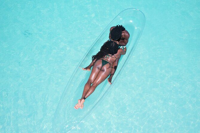 Providenciales Clear Kayak Shoots in Turks and Caicos Island - Drone hovering overhead: posing help that shows up in the final photos